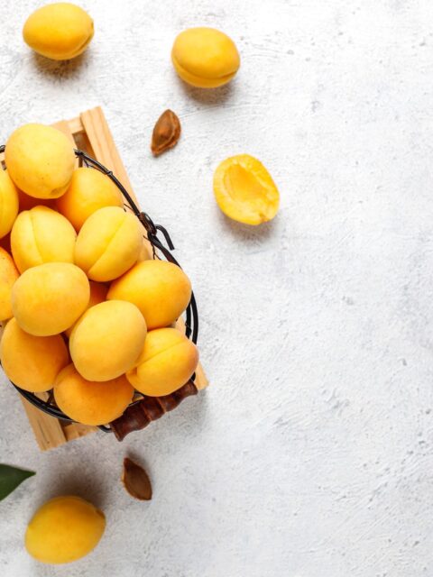 Fresh organic apricots,summer fruit,top view Fresh organic apricots,summer fruit,top view